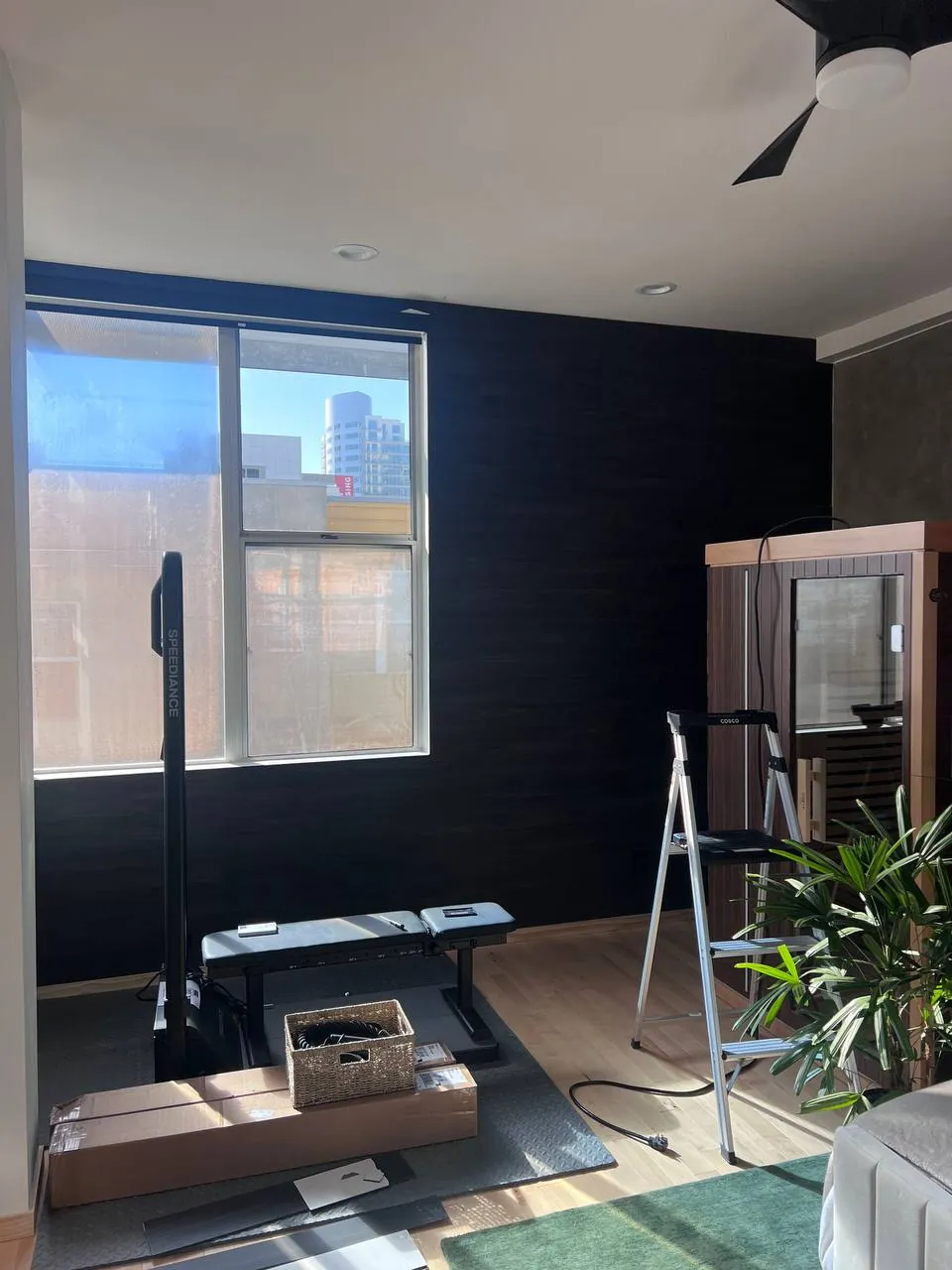 Floor-to-ceiling dark wood-slat accent wall