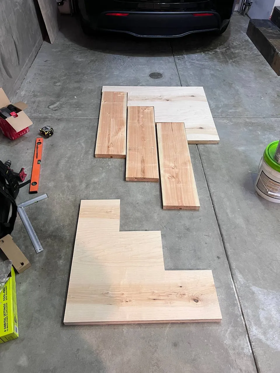 Laminate plank flooring being laid during installation