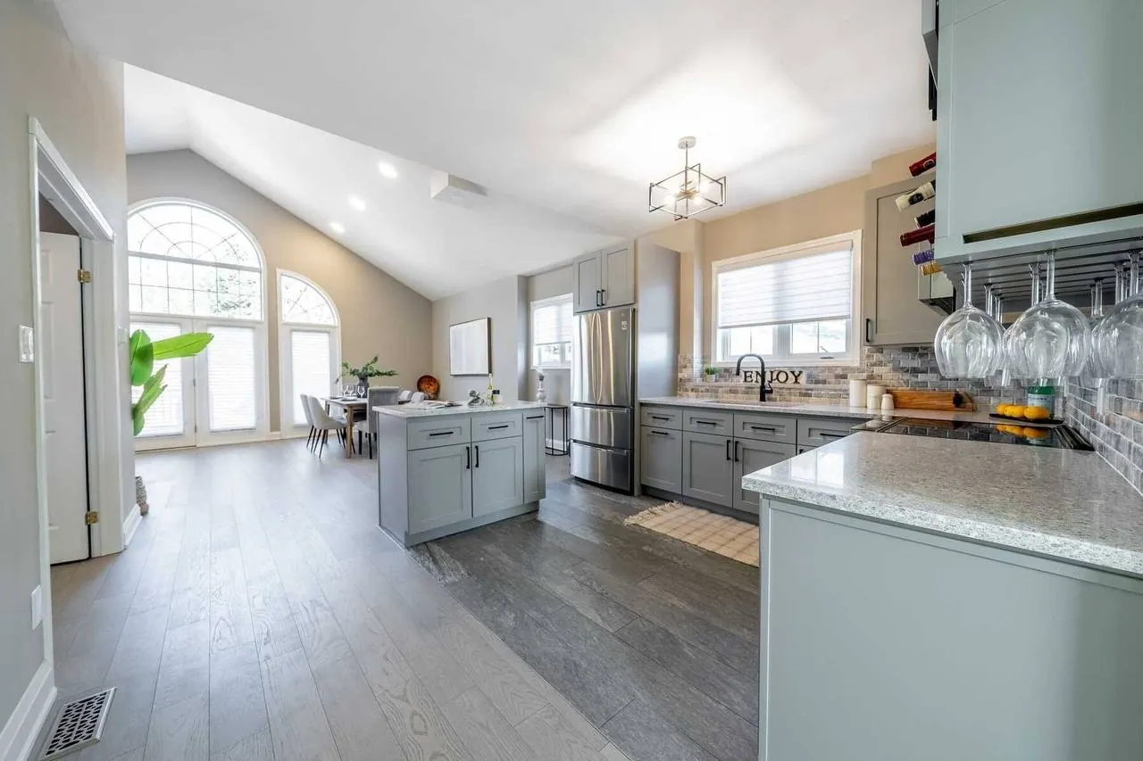 Finished white shaker kitchen with stainless appliances